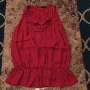 Red tank top with ruffles at neckline and bottom